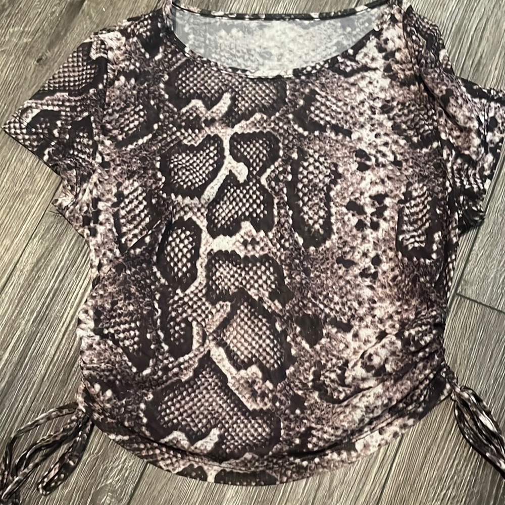 Mesh snake skin print shirt.